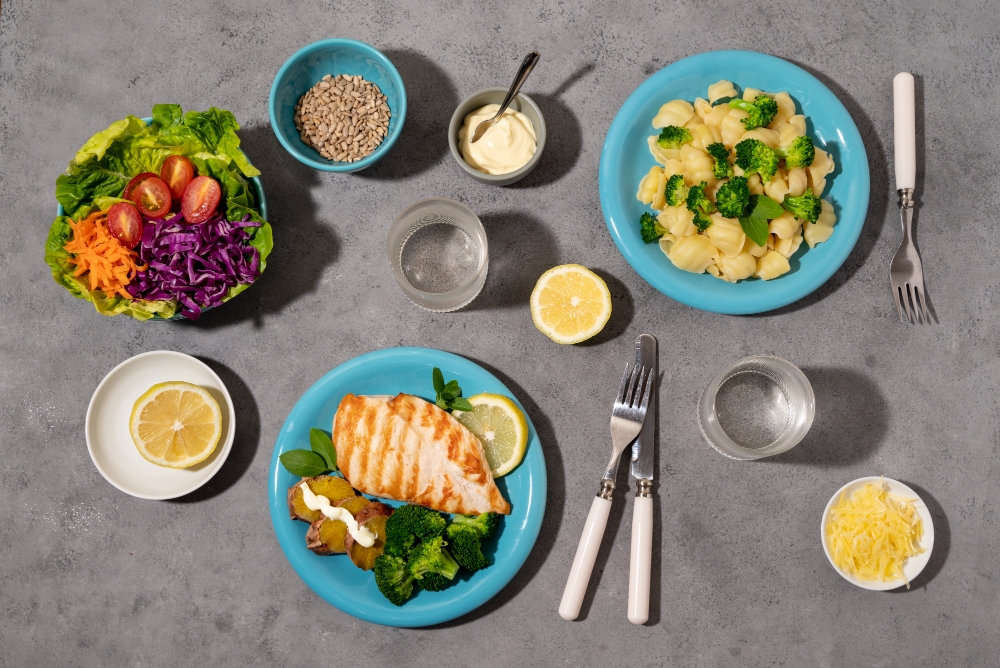 A colorful bowl of Buddha bowl ingredients, including quinoa, roasted vegetables, and tahini dressing, arranged on a rustic table.
Quick & Easy Lunch Ideas