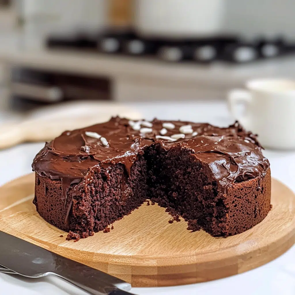 moist chocolate protein cake sliced on a board